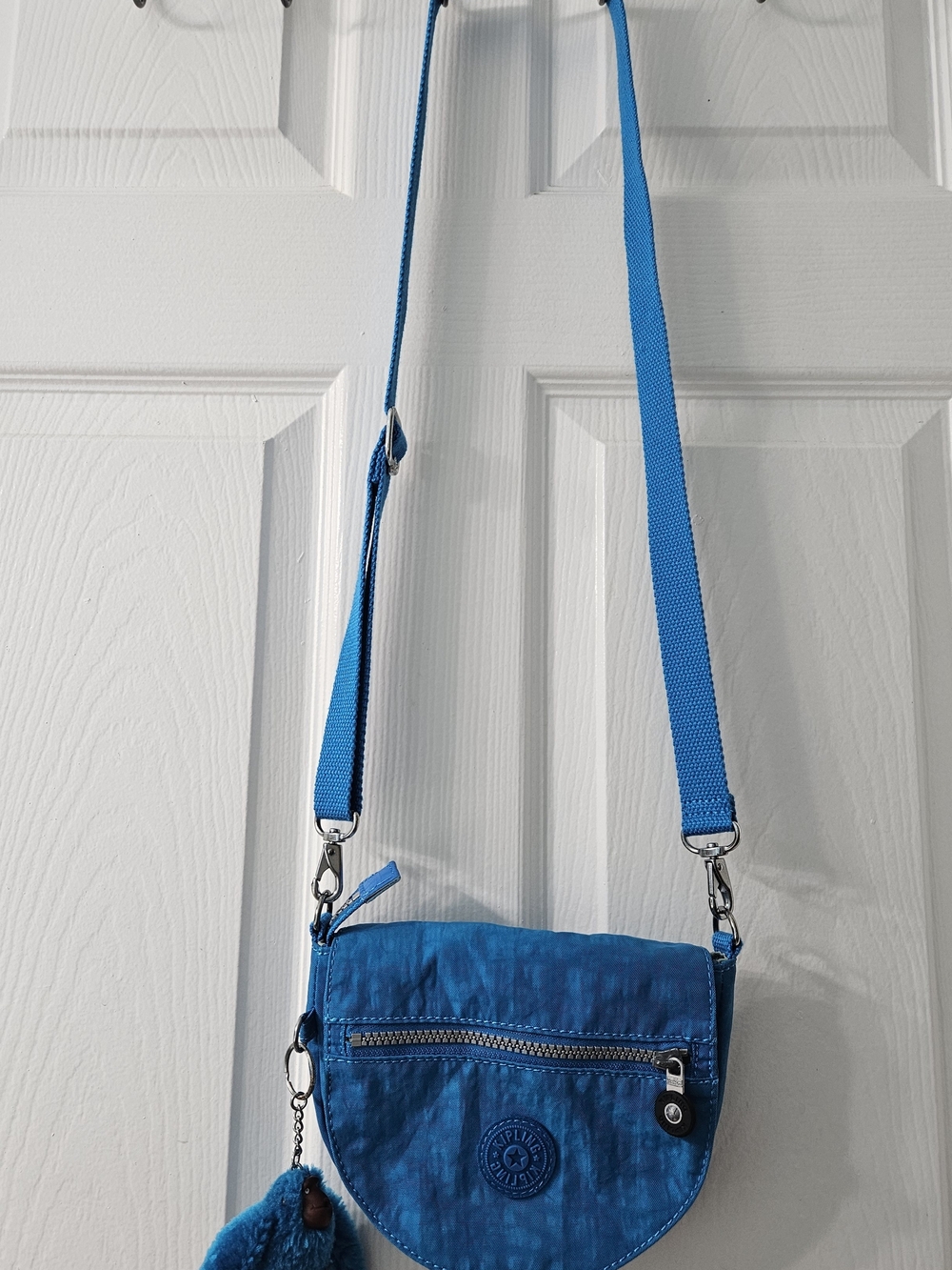 Kipling Blue Crossbody Bag with Pom Keychain